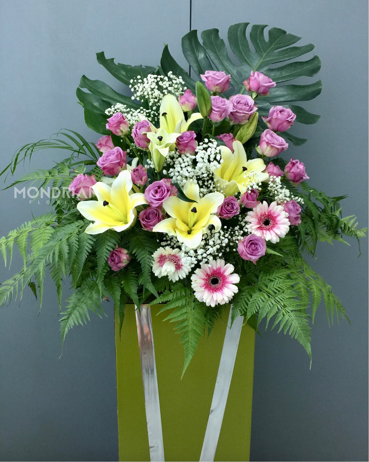 Send Condolence flower Stand | funeral flower stand | sympathy flower stand | yellow lily funeral flower sg