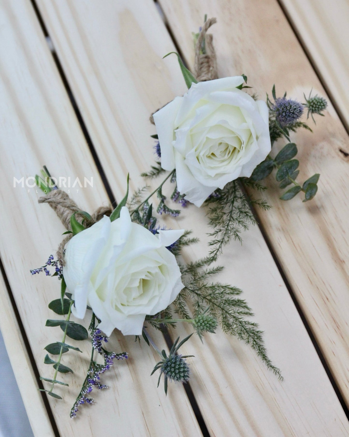 Wedding flower | groom boutonniere| Groom Corsage | White rose corsage | sg wedding florist | Mondrian Florist SG