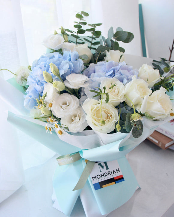blue_hydrangea_bouquet - white_rose_bouquet - mondrian_florist