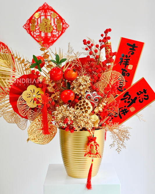 a golden and red theme traditional chinese new year vase arrangement