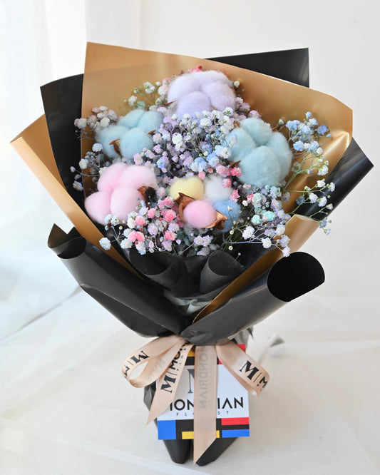 a bouquet of rainbow cotton flower and rainbow baby's breath flower