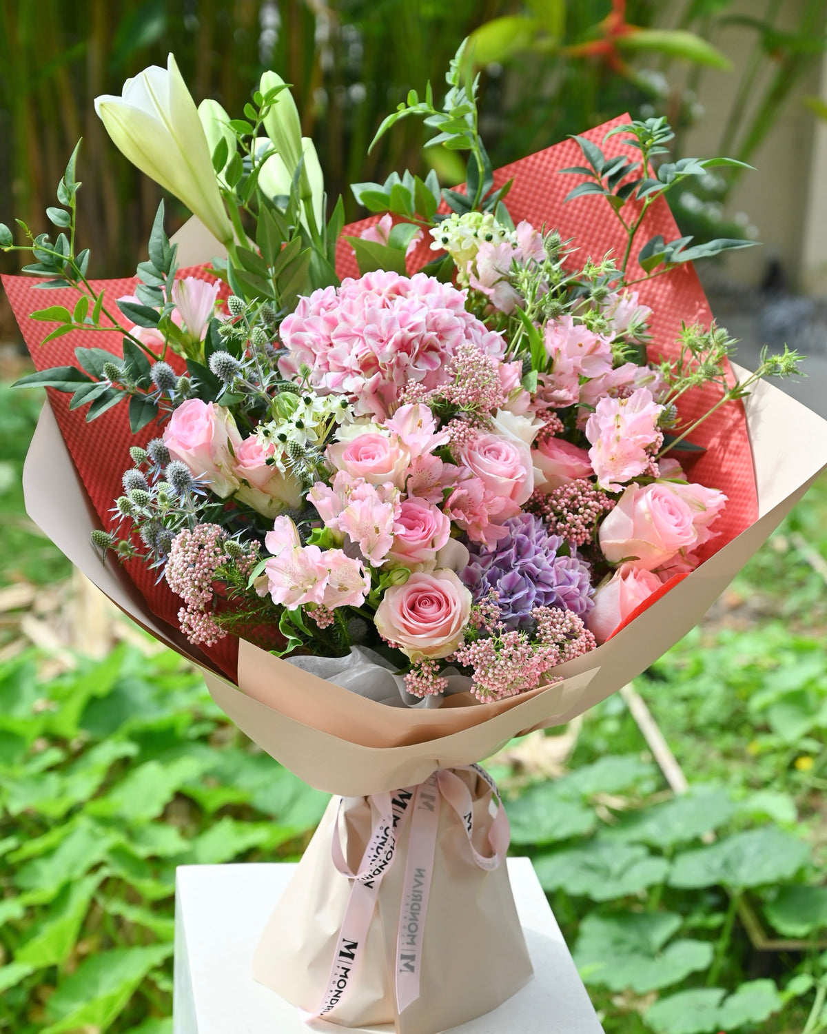 a luxury pink hydrangea and rose fresh flower bouquet by Mondrian Florist