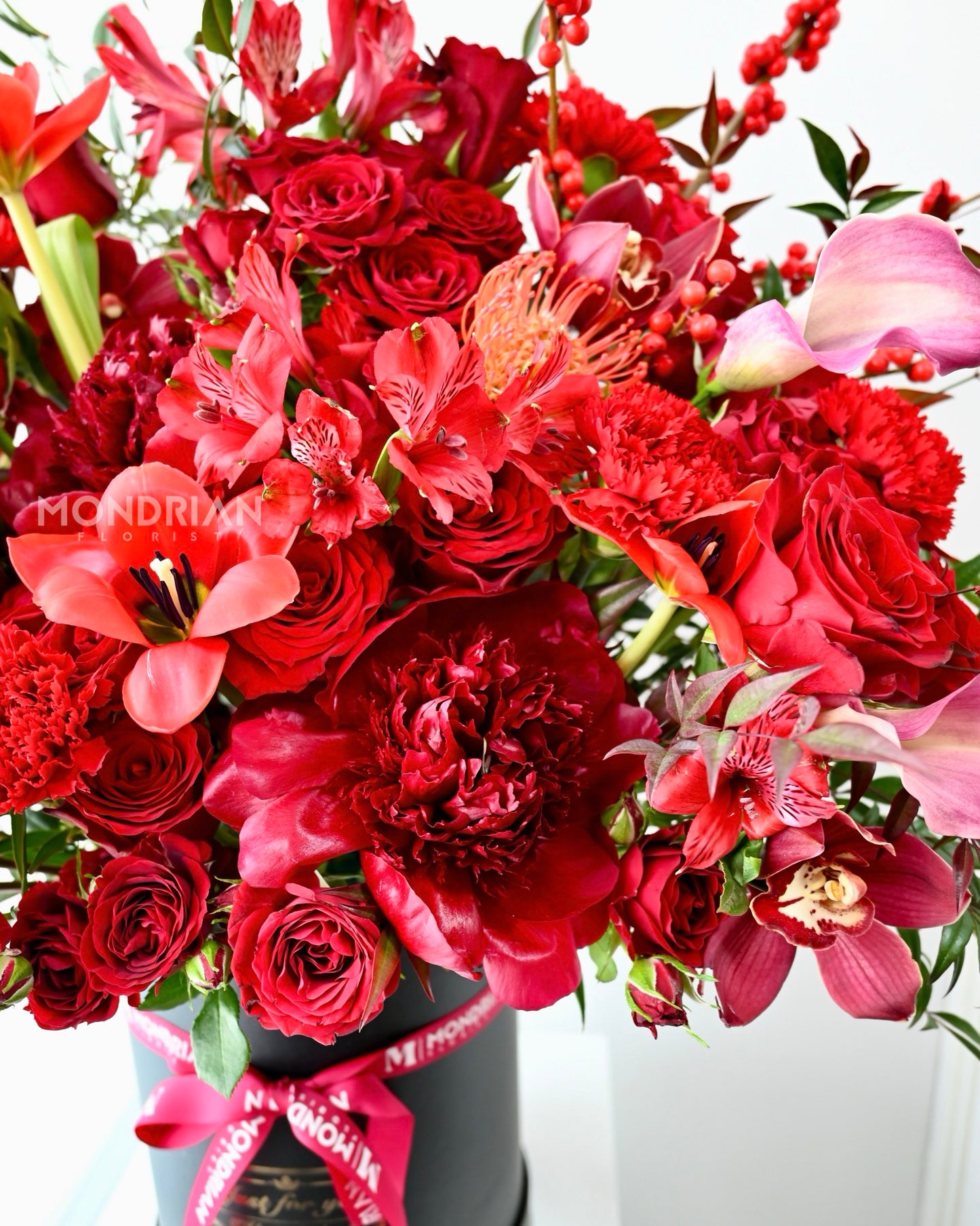 close up of a premium flower box by Mondrian Florist in red theme