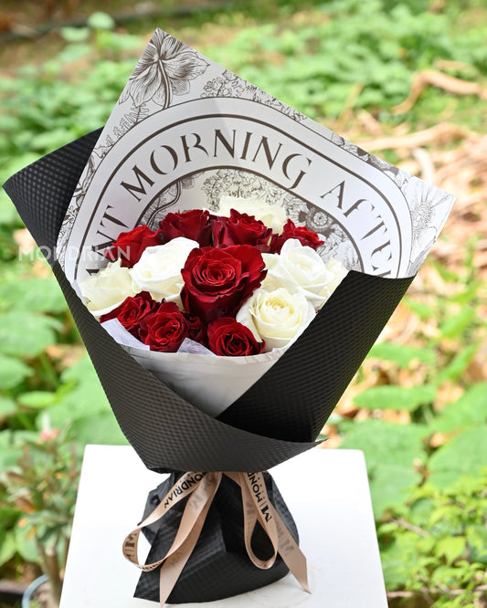 mixed red and white rose bouquet by Mondrian Florist